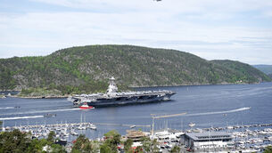 <p>The aircraft carrier USS Gerald R. Ford passes on its way to the Oslo Fjord, at Drobak, Norway, Wednesday, May 24, 2023. Picture: Terje Pedersen/NTB Scanpix via AP</p>