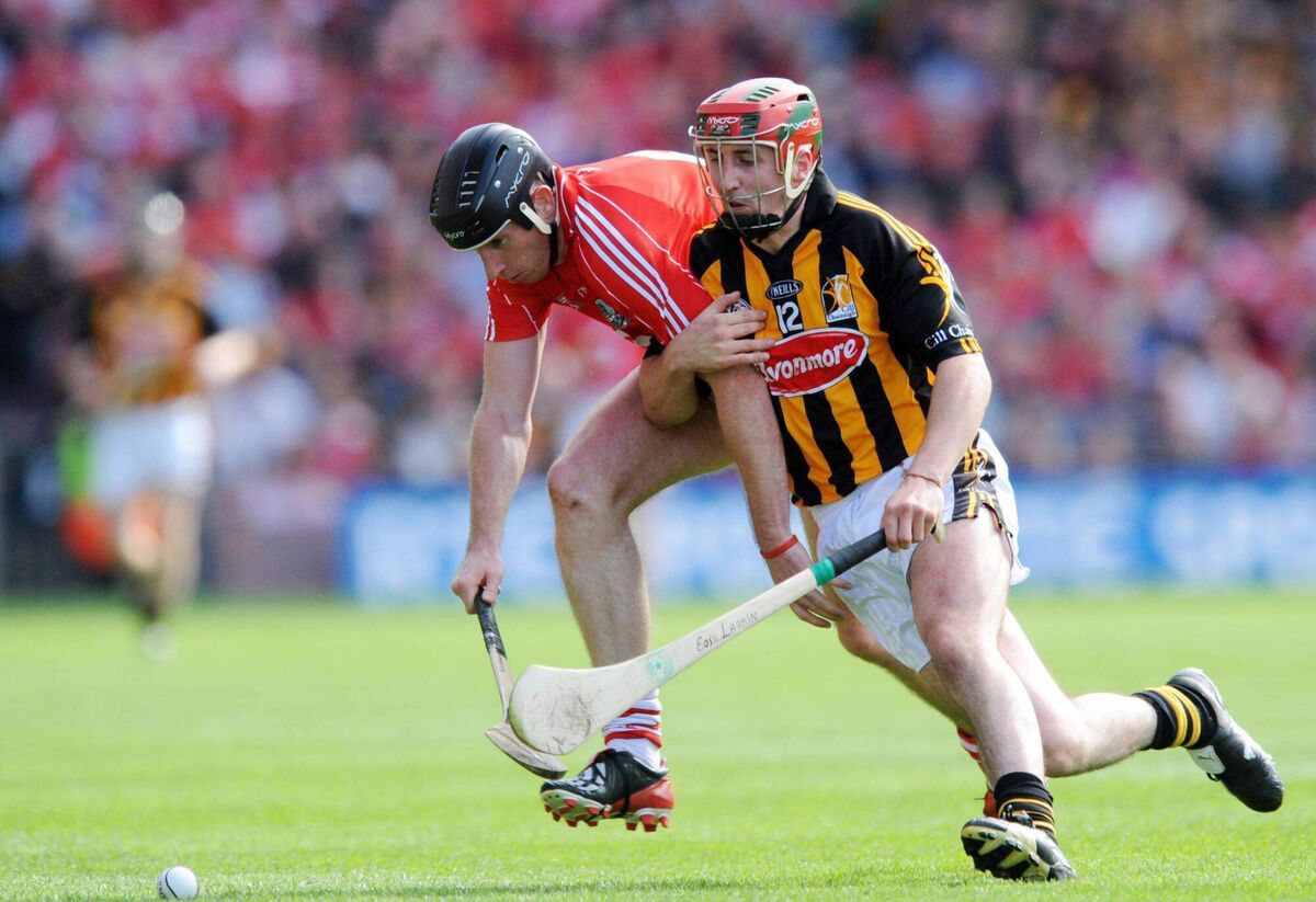 Eoin Larkin, Kilkenny, in action against John Gardiner, Cork. Pic: David Maher/Sportsfile