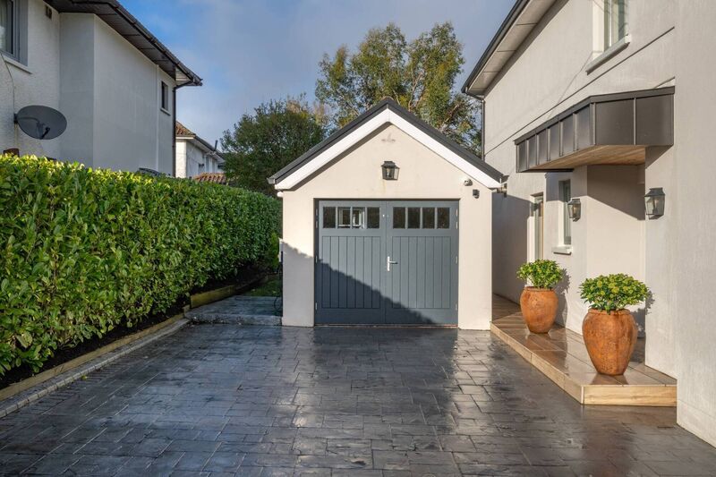 Side entrance and detached garage