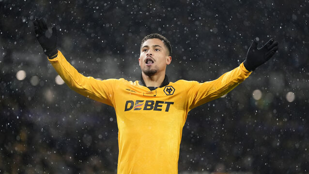 <p>Wolves’ Joao Gomes celebrates the opener at Molineux (PA)</p>