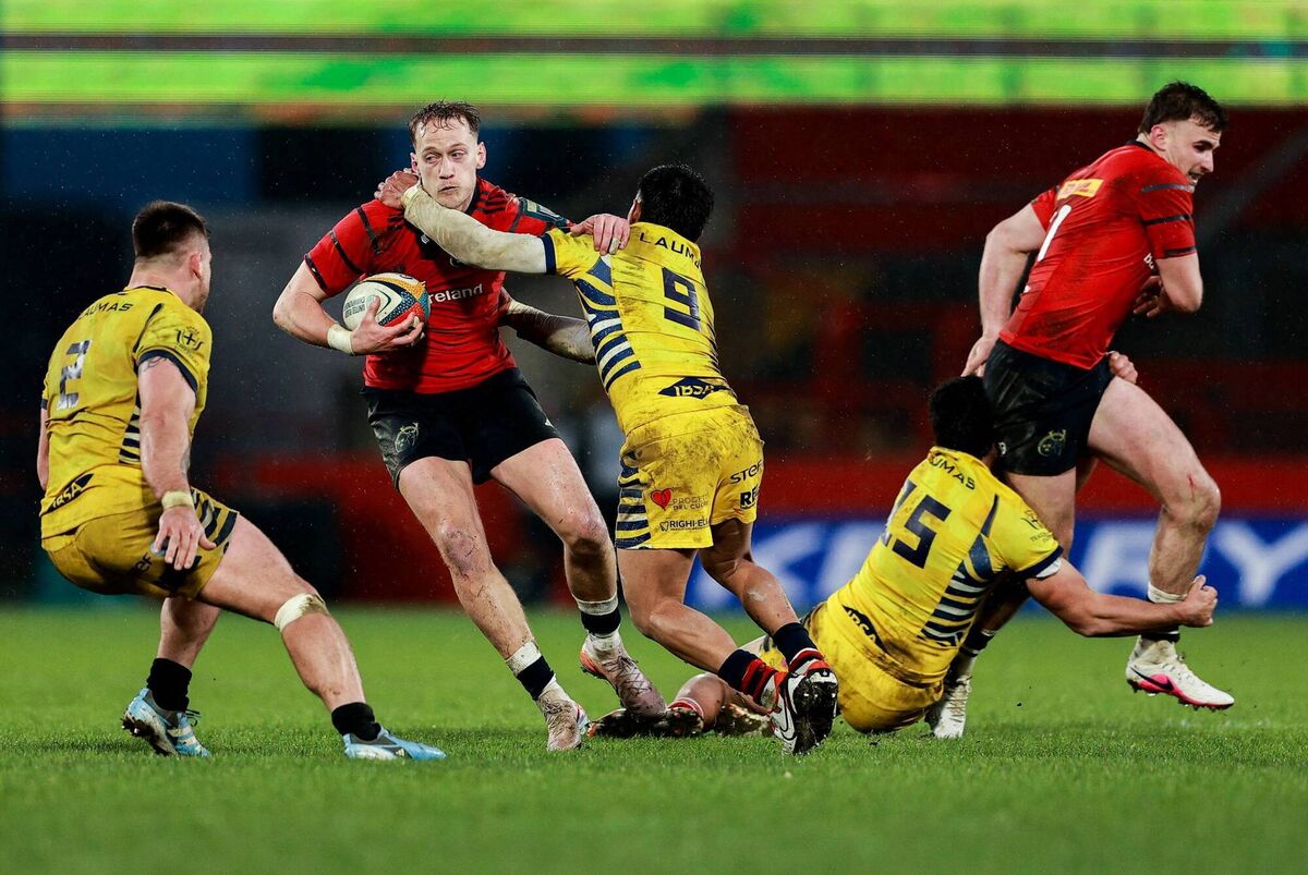 Mike Haley of Munster is tackled by Gonzalo Garcia of Zebre Parma. Pic: Thomas Flinkow/Sportsfile