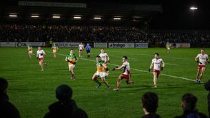 <p>Marcas Dalton of Offaly and Michael Rafferty of Tyrone. Pic: Ramsey Cardy/Sportsfile</p>