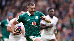<p>ON HIS BIKE: Stuart McCloskey on the surge but it was a gallop back towards his own endline against England that will be remembered for a long time. 'You’ve got to chase back every one,' he says. Pic: Ramsey Cardy/Sportsfile</p>