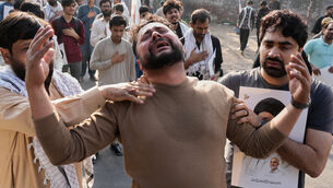 <p>Shiite Muslims mourn the death of Iranian Supreme Leader Ayatollah Ali Khamenei during a protest against the US and Israel in Lahore, Pakistan (KM Chaudary/AP)</p>