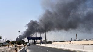 <p>A plume of smoke caused by an Iranian strike is seen in Dubai in the United Arab Emirates. Picture: Altaf Qadri/AP</p>