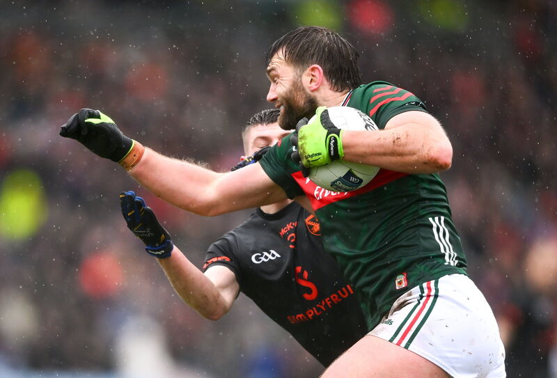 Aidan O'Shea of Mayo is tackled by Gareth Murphy of Armagh. Pic: Shauna Clinton/Sportsfile