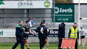 <p>Darragh O'Donovan of Limerick leaves the pitch after picking up an injury. Pic: Thomas Flinkow/Sportsfile</p>