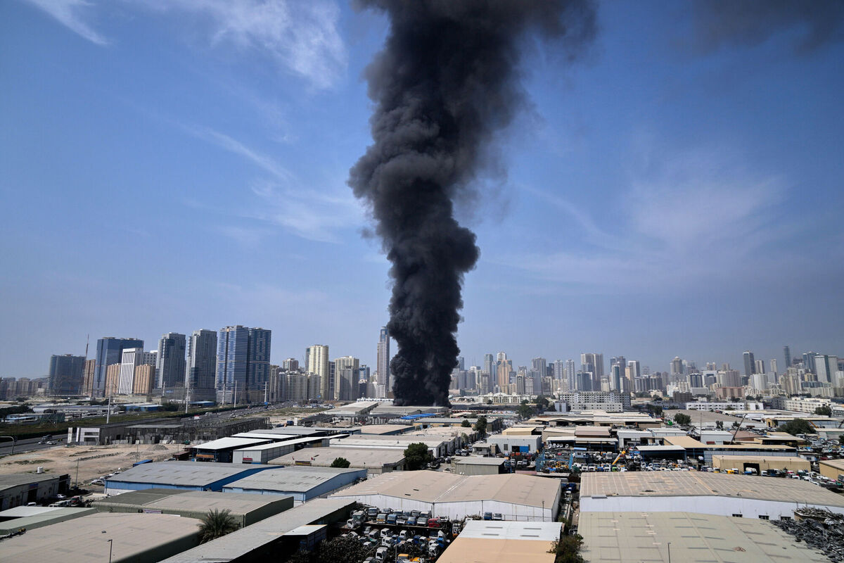 A black plume of smoke rises from a warehouse at the industrial area of Sharjah City in the United Arab Emirates following reports of Iranian strikes in Dubai, United Arab Emirates, Sunday, March 1, 2026. (AP Photo/Altaf Qadri) A black plume of smoke rises from a warehouse at the industrial area of Sharjah City in the United Arab Emirates following reports of Iranian strikes in Dubai, United Arab Emirates, Sunday, March 1, 2026. (AP Photo/Altaf Qadri)