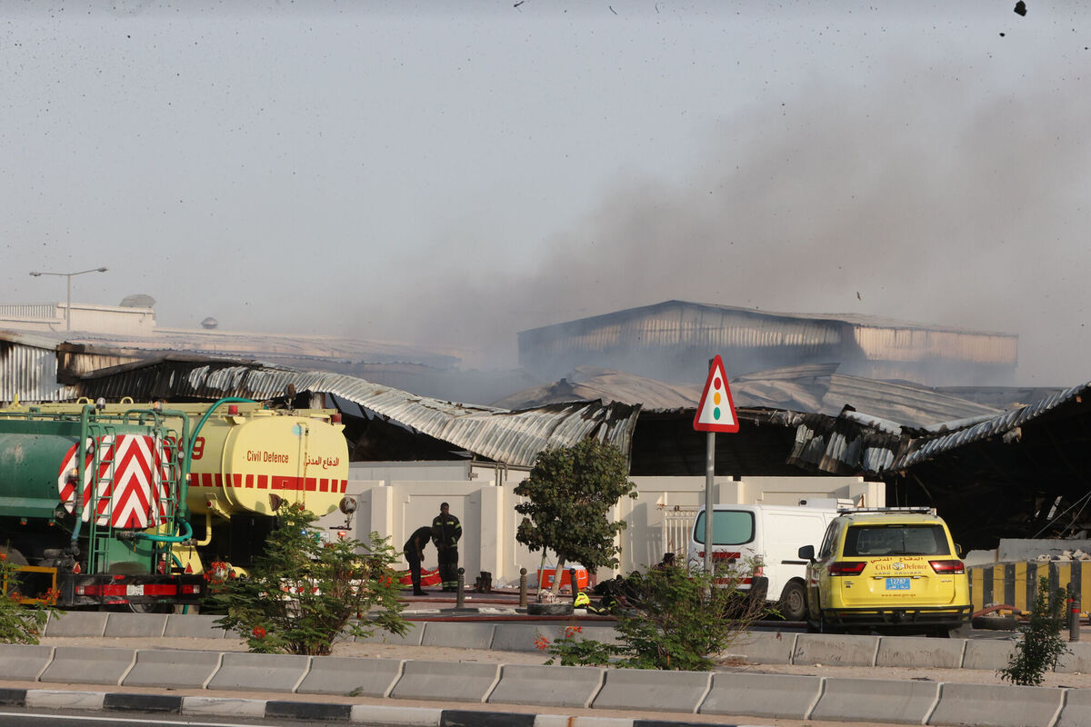 Firefighters work as smoke rises outside a damaged warehouse in an industrial area in Al Rayyan, Qatar, following an Iranian strike, Sunday, March 1, 2026. (AP Photo) Firefighters work as smoke rises outside a damaged warehouse in an industrial area in Al Rayyan, Qatar, following an Iranian strike, Sunday, March 1, 2026. (AP Photo)