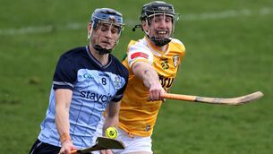 <p>Antrim's Seán Duffin tackles Brian Hayes of Dublin. Pic: ©INPHO/Leah Scholes</p>