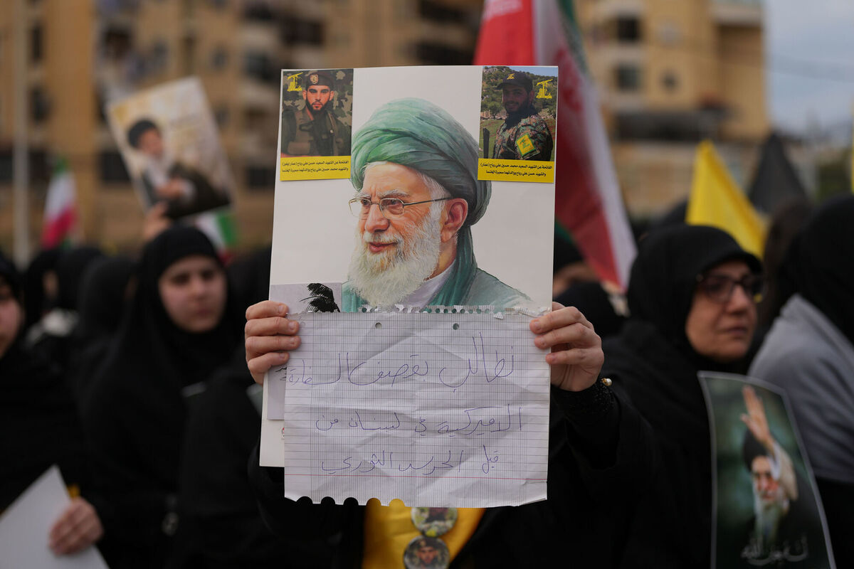 A Hezbollah supporter holds a portrait of the late Iranian Supreme Leader Ayatollah Ali Khamenei during a gathering in the southern suburbs of Beirut, Lebanon, on Sunday. Picture: AP Photo/Hassan Ammar