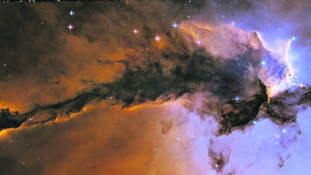 A stellar spire in the Eagle Nebula. One new theory which is gaining some traction suggests the Universe is actually 27 billion years old. That’s twice as old as we thought until recently. Picture: NASA/PA Wire <p>A stellar spire in the Eagle Nebula. One new theory which is gaining some traction suggests the Universe is actually 27 billion years old. That’s twice as old as we thought until recently. Picture: NASA/PA Wire</p>