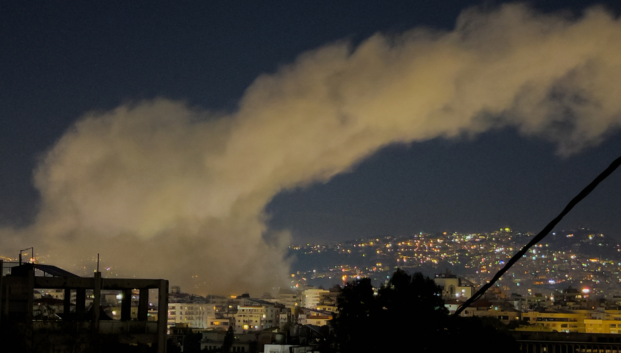 War on Iran widens as Israel launches strikes on Beirut after Hezbollah fires missiles across border