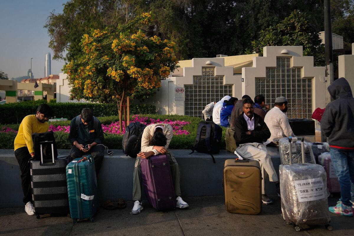 Passengers stranded by the closure of Dubai International Airport await for assistance in the airport parking lot in Dubai, United Arab Emirates, Sunday, March 1, 2026. Picture: AP Photo/Altaf Qadri