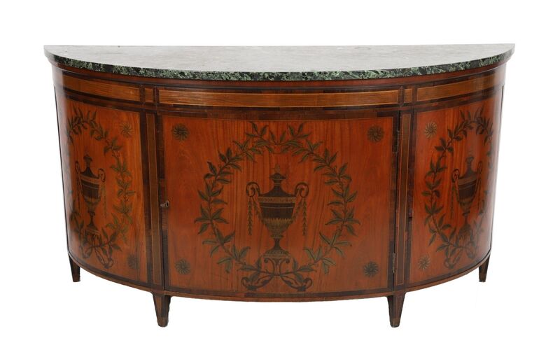 An Irish 19th-century inlaid commode.