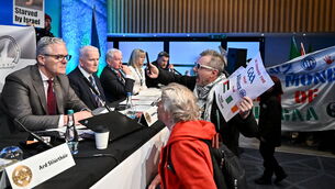 <p>GAA president Jarlath Burns talks to anti Allianz protesters during Congress at Croke Park on Saturday. Pic: Piaras Ó Mídheach/Sportsfile</p>