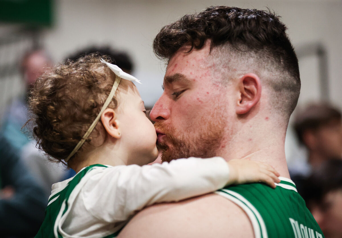 Ireland's Jordan Blount with his daughter Layla, aged 1, after winning the game. Blount announced his retirement from 5v5 international basketball before the match. Pic: ©INPHO/Tom Maher Ireland's Jordan Blount with his daughter Layla, aged 1, after winning the game. Blount announced his retirement from 5v5 international basketball before the match. Pic: ©INPHO/Tom Maher