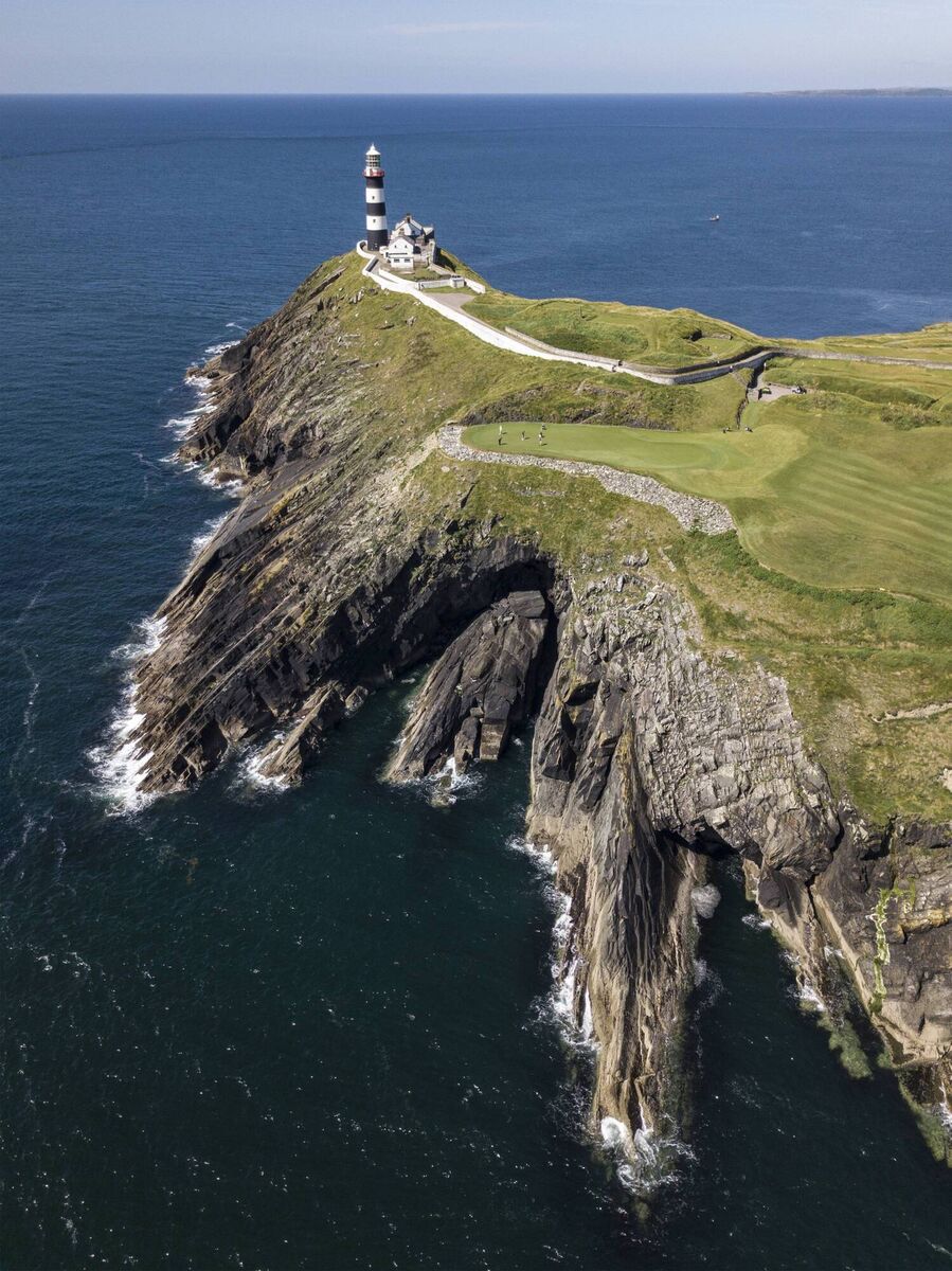 An aerial view of the sea caves beneath the fourth green at the Old Head of Kinsale golf resort in Co Cork. Photo: Jakub Walutek An aerial view of the sea caves beneath the fourth green at the Old Head of Kinsale golf resort in Co Cork. Photo: Jakub Walutek