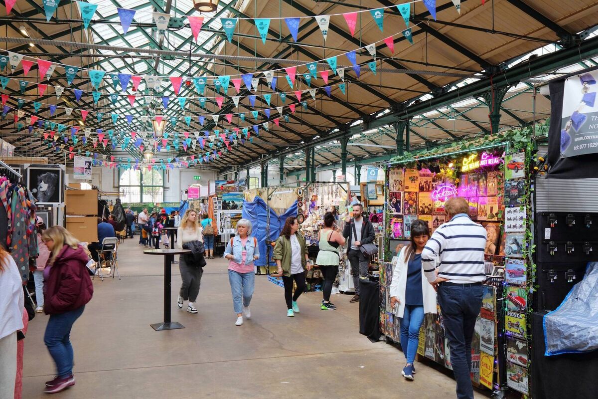 People visiting the beloved St George's Market, old market hall in Belfast. 