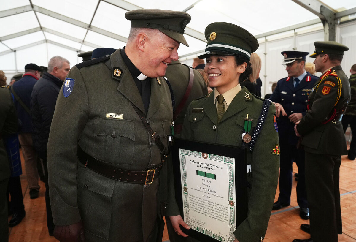 Father Paul Murphy and Private Ciara Shanahan at Renmore Barracks, Co Galway. Picture: Brian Lawless/PA Wire