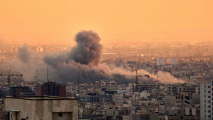 <p>A plume of smoke rises following a U.S.-Israeli military strike in Tehran, Iran, Tuesday, March 3, 2026. (AP Photo/Vahid Salemi)</p>