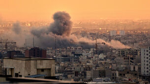 <p>A plume of smoke rises following a U.S.-Israeli military strike in Tehran, Iran, Tuesday, March 3, 2026. (AP Photo/Vahid Salemi)</p> <p>A plume of smoke rises following a U.S.-Israeli military strike in Tehran, Iran, Tuesday, March 3, 2026. (AP Photo/Vahid Salemi)</p>