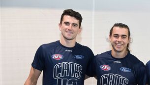 <p>IRISH INFLUENCE: Geelong senior coach Chris Scott said the club "like the development" of both Mark O'Connor and Oisín Mullin. Pic: Morgan Hancock/AFL Photos/via Getty Images</p>