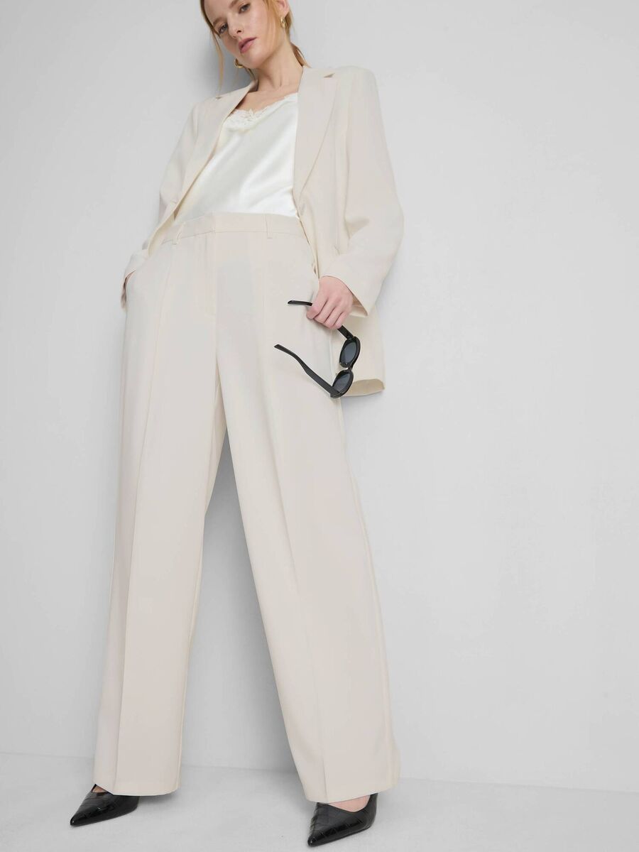 White blazer, €28, and straight leg trouser, €18