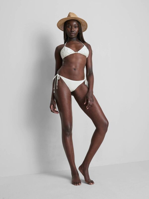 Shell pearl bikini top, €8, and bottom, €5 Shell pearl bikini top, €8, and bottom, €5