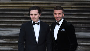 <p>David Beckham and his son, Brookyln, are involved in a family feud (Kirsty O’Connor/PA)</p>