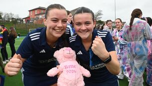<p>Scoil Mhuire co-captains Sophie Moloney and Amy Noonan celebrating their So Hockey Schoolgirls Cup win. The led their side to the domestic double as they added the league title, defeating Crescent Comprehensive in the final by 2-0. Picture: Larry Cummins</p>