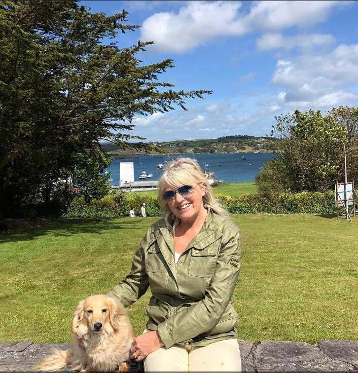 Fiona Kennedy with her dog Tina in Schull, West Cork. 