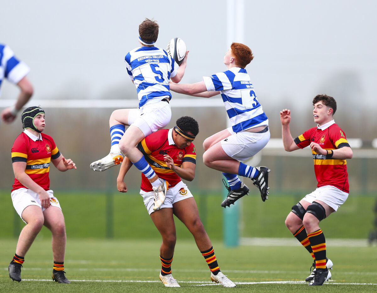 Rockwell’s James Julian and Sam Power compete for the ball. Pic: ©INPHO,