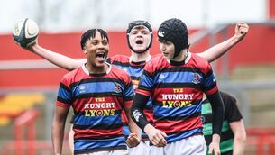 <p>MIGHTY MUNCHIN'S: St. Munchin's' Anluan White, Phelim Hennelly and Paddy Ryan celebrate winning. Pic: ©INPHO/Tom Maher.</p>
