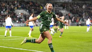 <p>LEADER: Ireland captain Katie McCabe celebrates her goal against France, in a 2-1 loss. Pic: Niall Carson/PA</p>