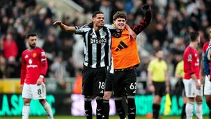 <p>Newcastle United's William Osula (left) celebrates with Sean Neave after scoring the winner against Manchester United at St James Park. Pic: Owen Humphreys/PA</p>