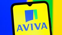 In this photo illustration, the Aviva logo is seen displayed
