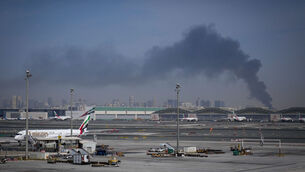 <p>An Emirates airplane are parked at the Dubai International Airport after its closure on Sunday. Picture: AP Photo/Altaf Qadri</p> <p>An Emirates airplane are parked at the Dubai International Airport after its closure on Sunday. Picture: AP Photo/Altaf Qadri</p>