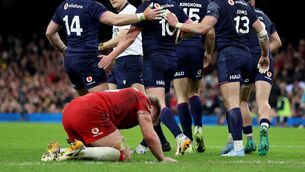 <p>KICKED WHILE DOWN: Scotland's Finn Russell (second left) celebrates with his team mates after scoring a try in a comeback win over Wales. Pic:L Nigel French/PA</p>