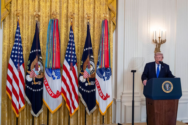 During a Medal of Honour ceremony for three Army veterans, President Donald Trump barely acknowledged the first casualties of his war of choice, instead giving a lengthy paean to his gold curtains and ballroom construction project. Picture: AP/Alex Brandon During a Medal of Honour ceremony for three Army veterans, President Donald Trump barely acknowledged the first casualties of his war of choice, instead giving a lengthy paean to his gold curtains and ballroom construction project. Picture: AP/Alex Brandon
