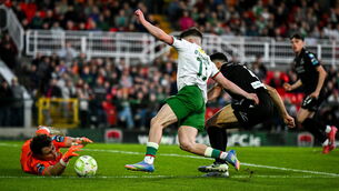 <p>THREATENING: Shamrock Rovers goalkeeper Ed McGinty makes a save from Cathal O'Sullivan of Cork City last season at Turner's Cross. Picture: Brendan Moran/Sportsfile</p>