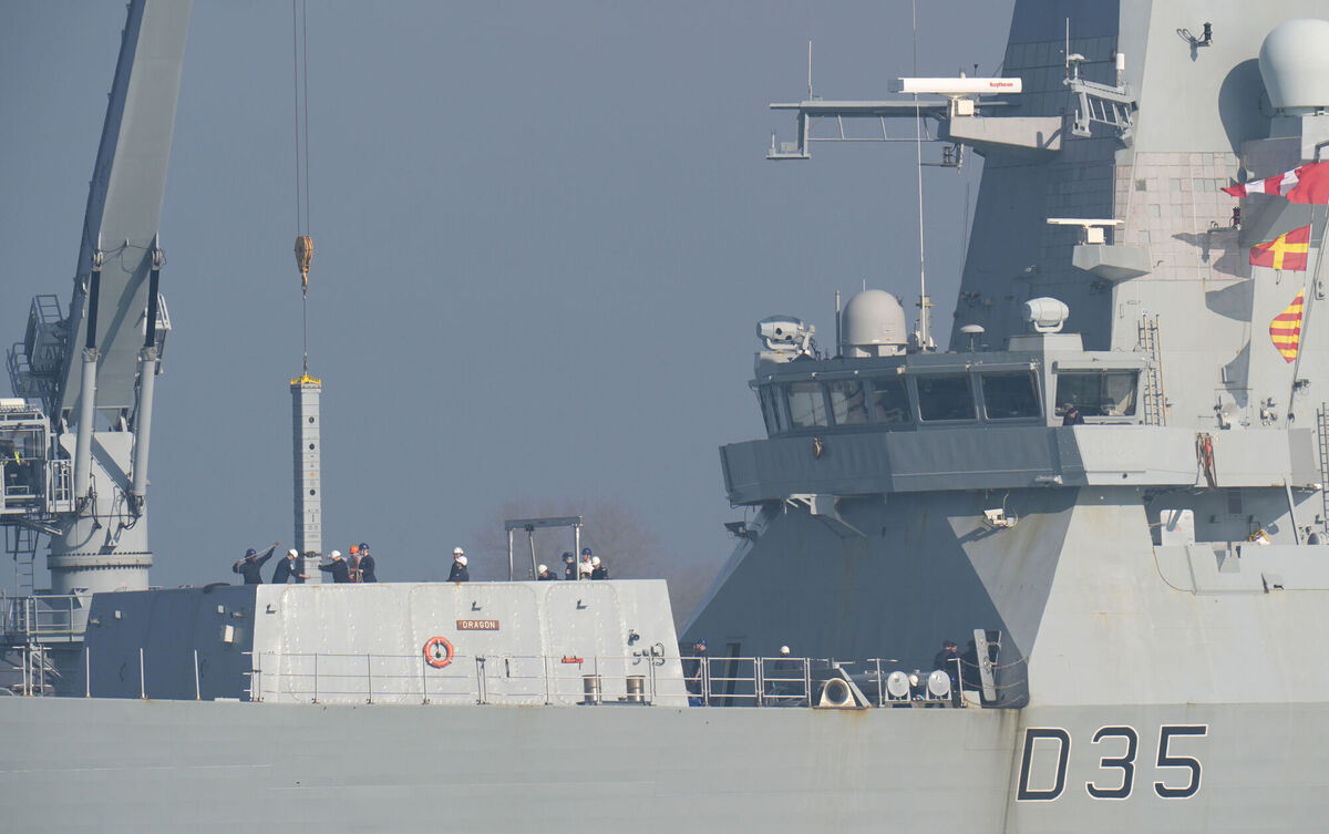 Equipment is brought on board the Royal Navy destroyer HMS Dragon in Portsmouth ahead of its deployment to Cyprus. Picture: Andrew Matthews/PA