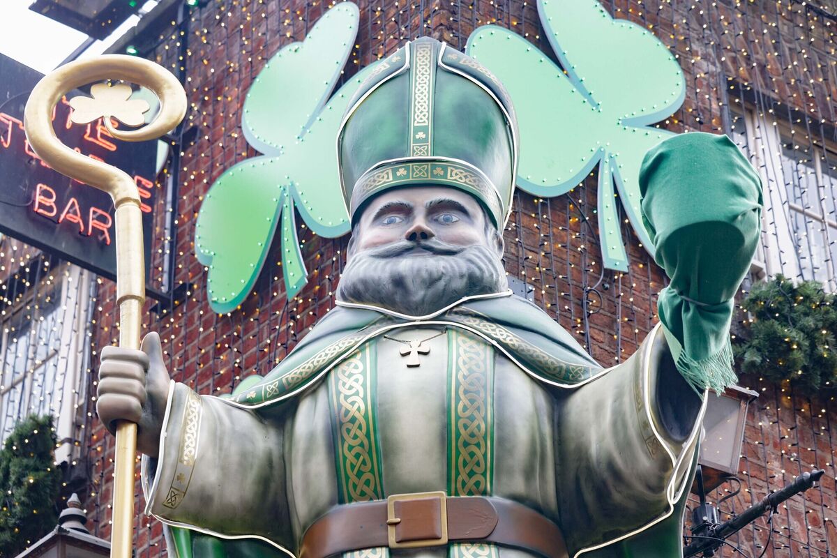 The large effigy of St Patrick was installed over the door of the Temple Bar pub in Dublin last week. Within a day, the pint of beer he is holding was covered up following complaints on social media. Picture: Leah Farrell/RollingNews