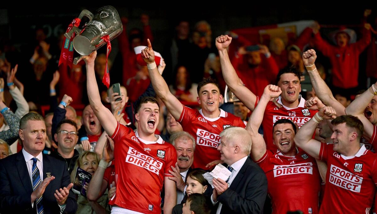 TOP DOGS: Cork captain Robert Downey lifts the Mick Mackey Cup. Pic: Piaras Ó Mídheach/Sportsfile
