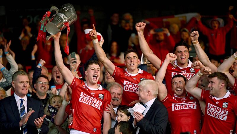TOP DOGS: Cork captain Robert Downey lifts the Mick Mackey Cup. Pic: Piaras Ó Mídheach/Sportsfile