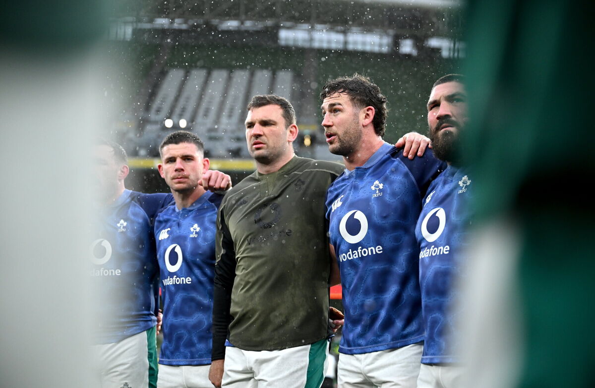 The Irish team huddle during a rain-soaked captain's run at the Aviva Stadium. Pic: Brendan Moran/Sportsfile