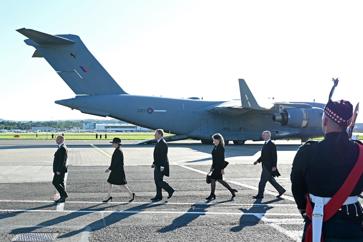 Dignitaries, including Scotland's First Minister Nicola Sturgeon (second left) and Scottish Secretary Alister Jack (centre) prepare for the arrival of the coffin of Britain's Queen Elizabeth II at Edinburgh Airpor. FIle picture: PA