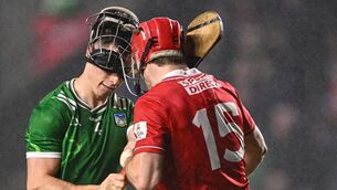 <p>HEAD TO HEAD: The faceguards on the helmets of Barry Murphy of Limerick and Alan Connolly of Cork tangle as they tussle during the 2025 Allianz Hurling League Division 1A match between Cork and Limerick at SuperValu Páirc Uí Chaoimh in Cork. Photo by Piaras Ó Mídheach/Sportsfile </p>