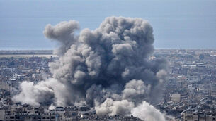 Smoke rises following an Israeli airstrike in Dahiyeh, Beirut (Hussein Malla/AP)