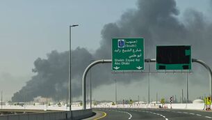 <p>An Iranian strike hits the port of Jebel Ali in Dubai on Sunday. Iranian missiles flying across the Gulf are not the sort of thing that fits easily into a real estate brochure. Picture: Fadel Senna/AFP via Getty Images</p>